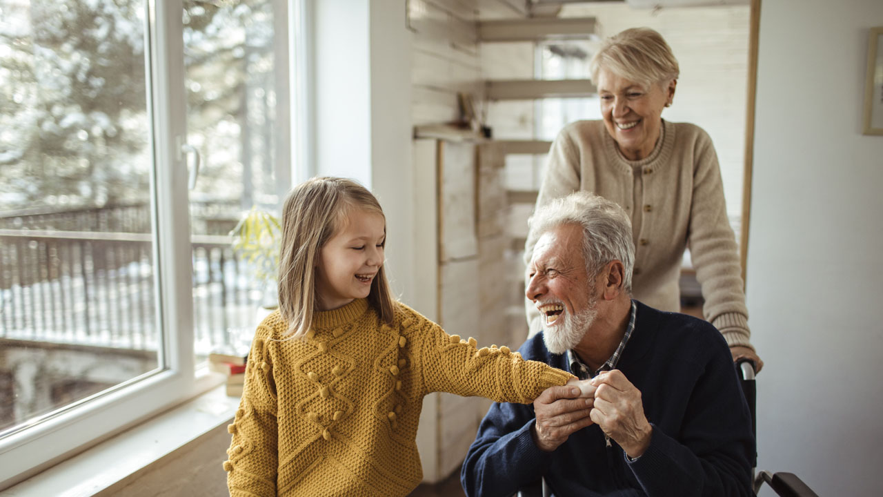 Parents playing with their daughter